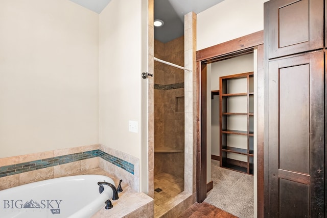 bathroom with independent shower and bath