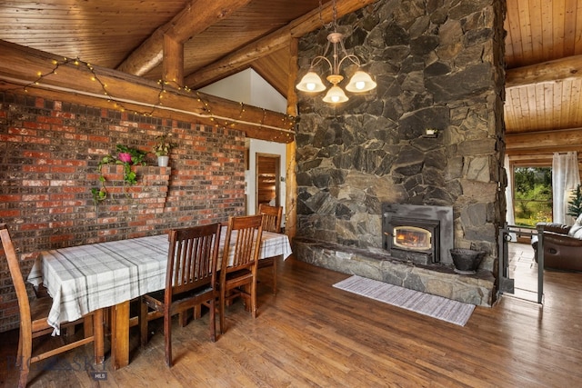 dining space featuring wood-type flooring, wooden ceiling, a chandelier, and beamed ceiling