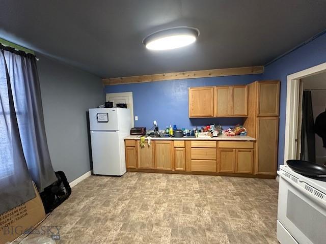 kitchen with white refrigerator