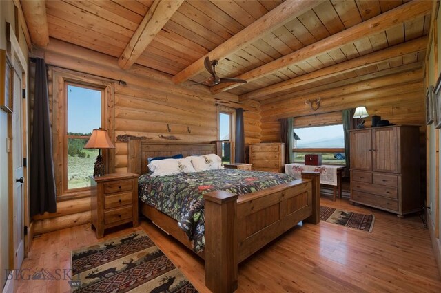 75 Madison Trl, Cameron, MT 59720 - bedroom with wood ceiling, beamed ceiling, and light wood-type flooring