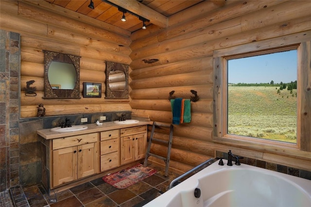 75 Madison Trl, Cameron, MT 59720 - bathroom with beamed ceiling, rustic walls, vanity, wood ceiling, and a bath