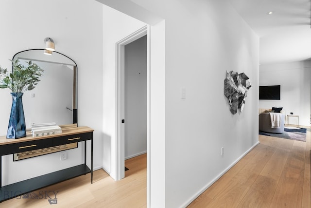 217 W Beall St Unit B, Bozeman, MT 59715 - hallway featuring light wood-style flooring
