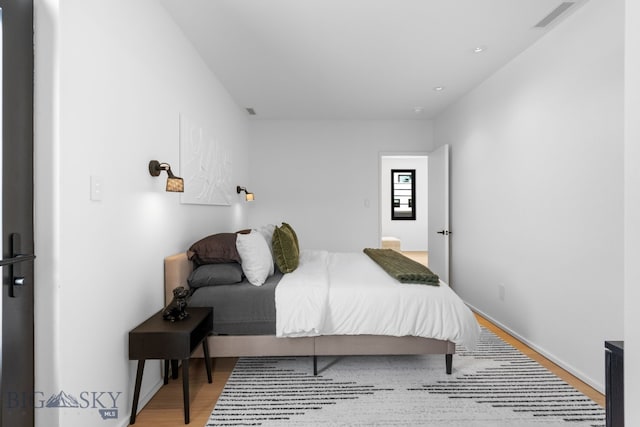217 W Beall St Unit B, Bozeman, MT 59715 - bedroom featuring light wood-style floors and recessed lighting