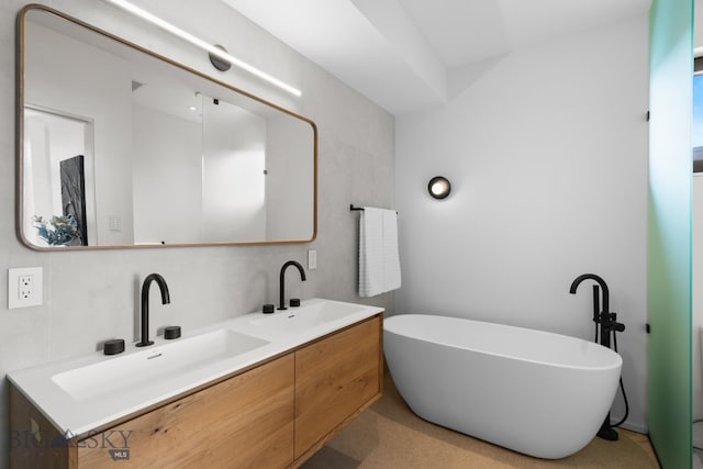 217 W Beall St Unit B, Bozeman, MT 59715 - bathroom with a freestanding bath and double vanity