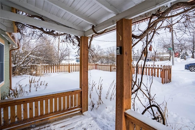 view of snow covered deck