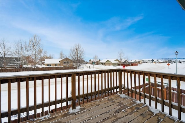 view of snow covered deck