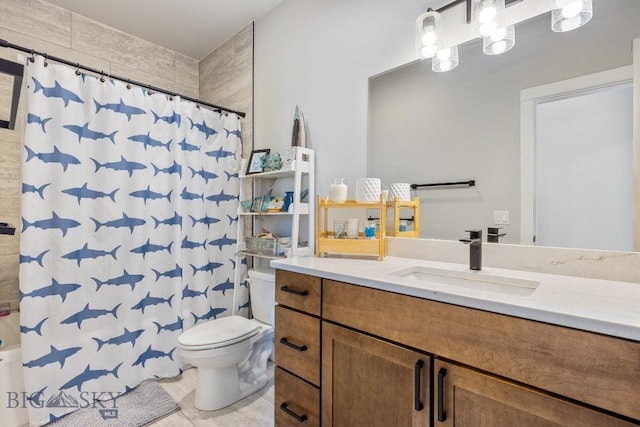 bathroom featuring vanity, toilet, and walk in shower