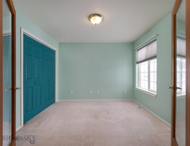 interior space with light carpet