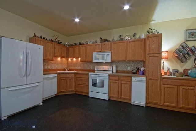 770 Mountain Moose Rd, Bozeman, MT 59715 - kitchen with white appliances, tasteful backsplash, light countertops, and a sink