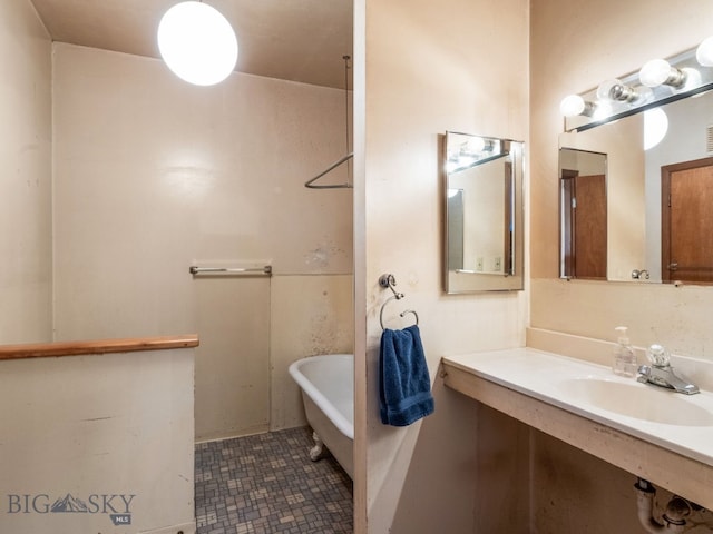 509 E Railroad N, Manhattan, MT 59741 - full bath with a freestanding bath, vanity, and tile patterned flooring