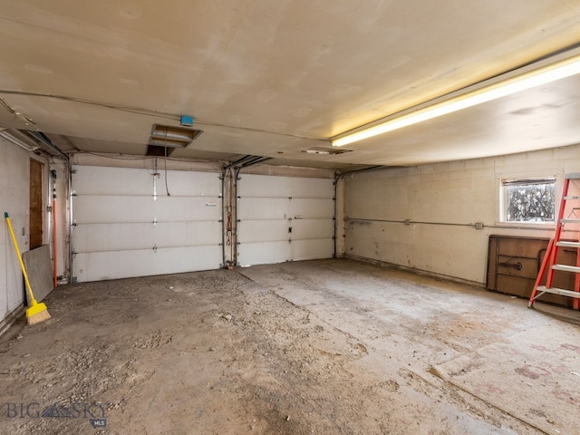 509 E Railroad N, Manhattan, MT 59741 - garage featuring a garage door opener
