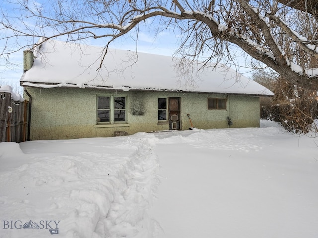 view of snow covered property