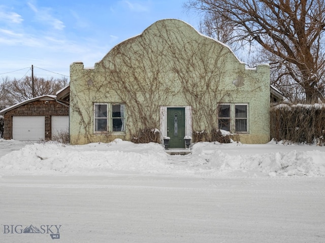 view of front of home with a garage