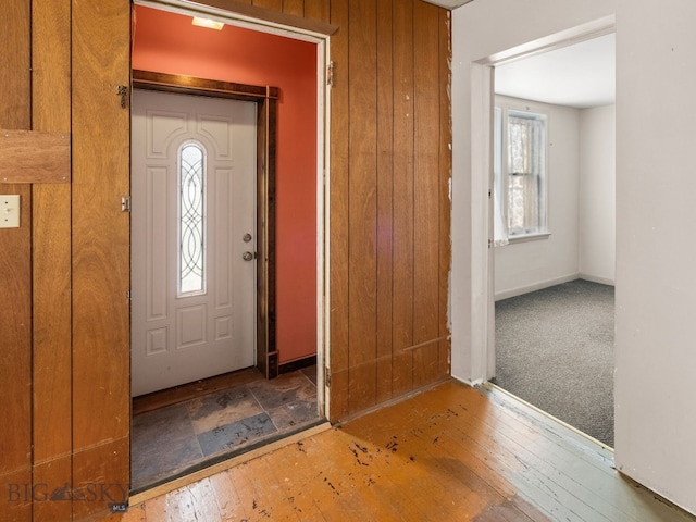 509 E Railroad N, Manhattan, MT 59741 - foyer with hardwood / wood-style floors, wooden walls, and baseboards