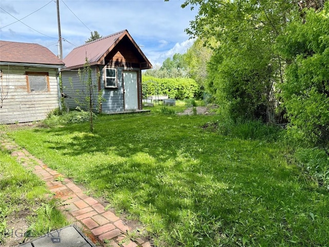 509 E Railroad N, Manhattan, MT 59741 - view of green lawn featuring an outbuilding