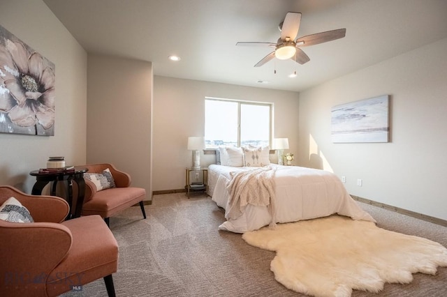 carpeted bedroom with ceiling fan