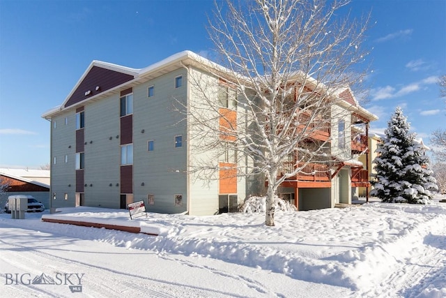 view of snow covered property