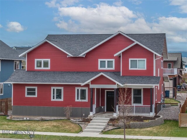 4562 Bembrick St, Bozeman, MT 59718 - view of front of house featuring a front yard, a shingled roof, and covered porch