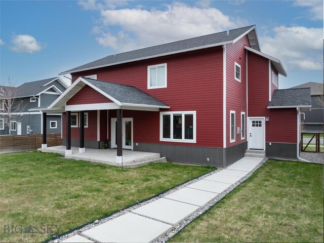 4562 Bembrick St, Bozeman, MT 59718 - back of house with fence, a yard, a patio, and entry steps
