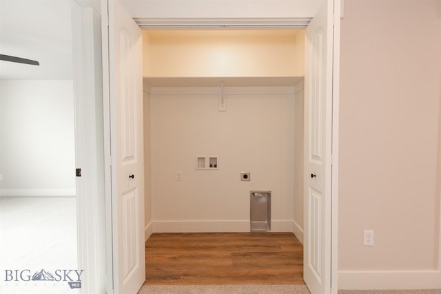 laundry area with hookup for an electric dryer, hookup for a washing machine, and hardwood / wood-style floors