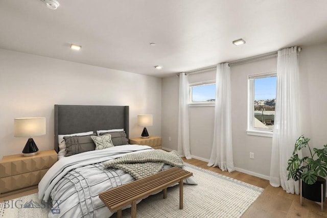 bedroom featuring light hardwood / wood-style floors