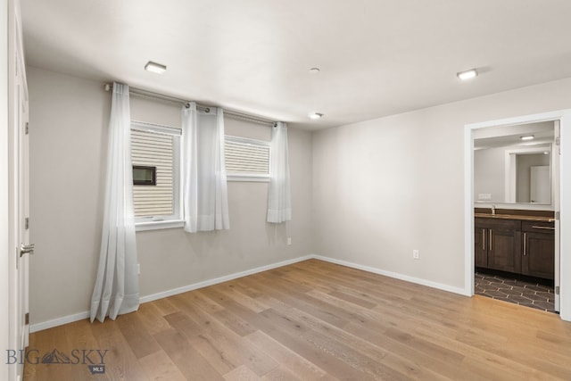 empty room featuring light hardwood / wood-style floors