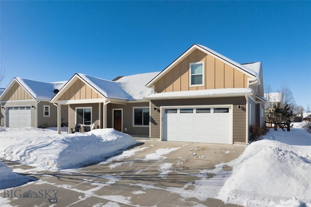 view of front of home with a porch and a garage