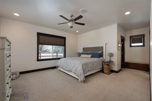 bedroom with light carpet and ceiling fan