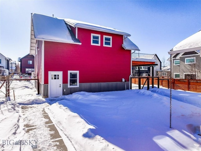 view of snow covered property