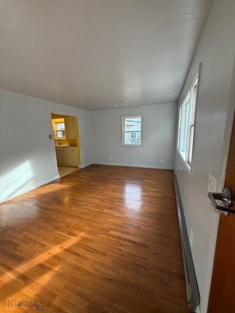 empty room featuring hardwood / wood-style floors