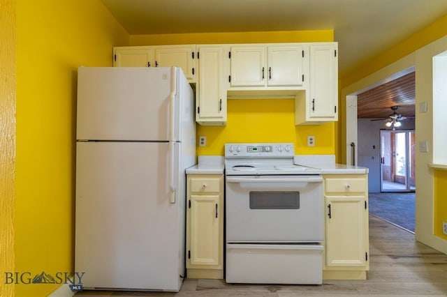 kitchen with ceiling fan, white appliances, and light wood-type flooring