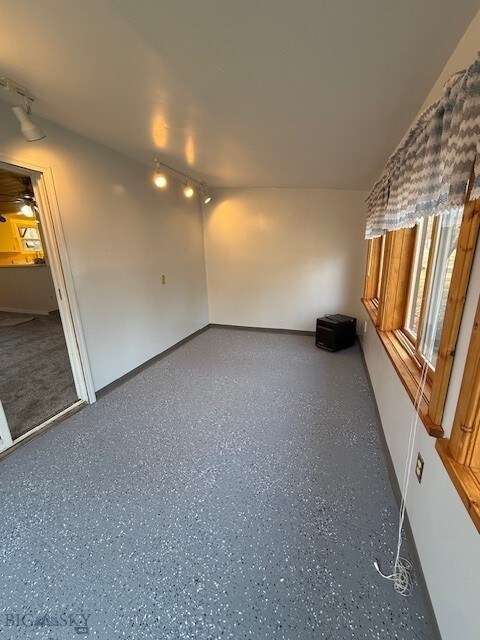 5042 US Highway 89 S, Livingston, MT 59047 - unfurnished room with rail lighting and baseboards