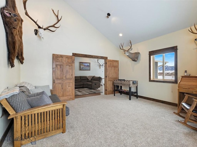 10 Fan Mountain Ct, Ennis, MT 59729 - living area with baseboards, carpet flooring, and high vaulted ceiling