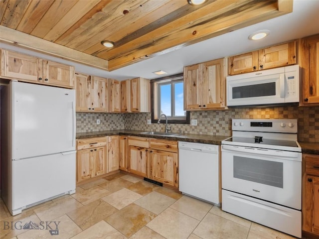 10 Fan Mountain Ct, Ennis, MT 59729 - kitchen with a sink, dark countertops, white appliances, and a raised ceiling