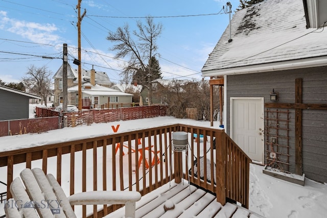 view of snow covered deck