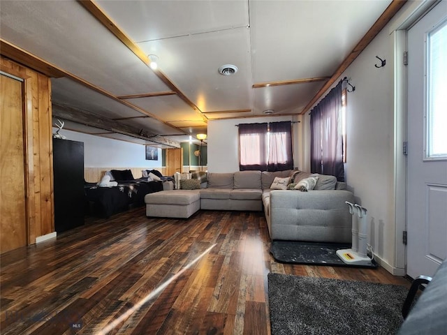 living room with dark hardwood / wood-style flooring