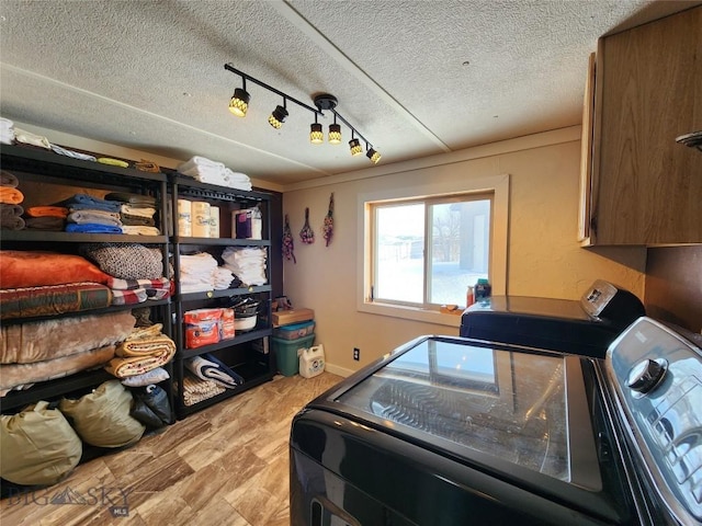 interior space with washing machine and clothes dryer