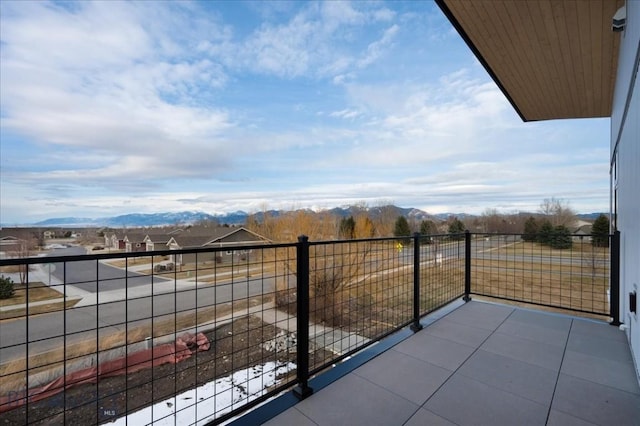 balcony featuring a mountain view