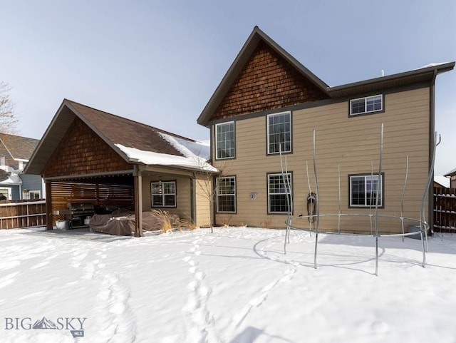 view of snow covered property