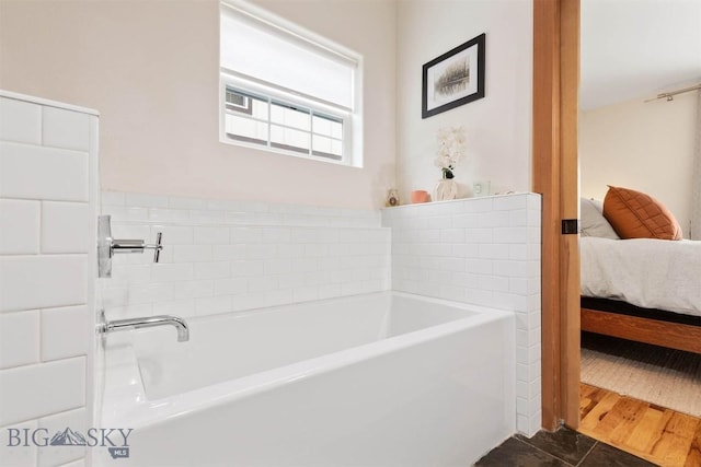 bathroom with a washtub