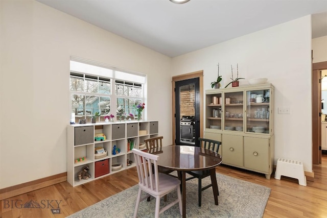 dining room with light hardwood / wood-style floors