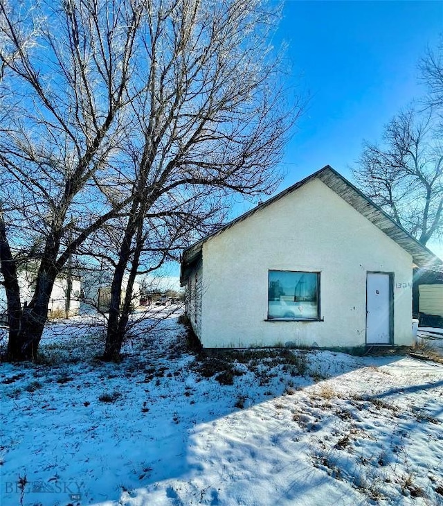 view of snow covered property