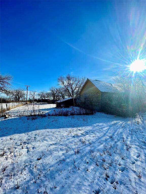 view of snowy yard