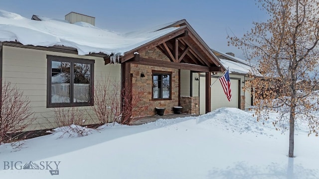 view of front of home with a garage