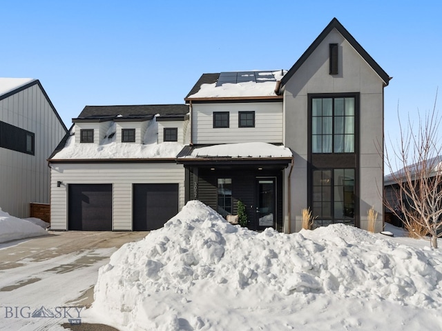 modern farmhouse with a garage