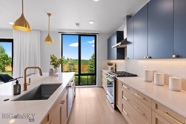3057 S 31st Ave, Bozeman, MT 59718 - kitchen with appliances with stainless steel finishes, tasteful backsplash, healthy amount of natural light, light countertops, and recessed lighting