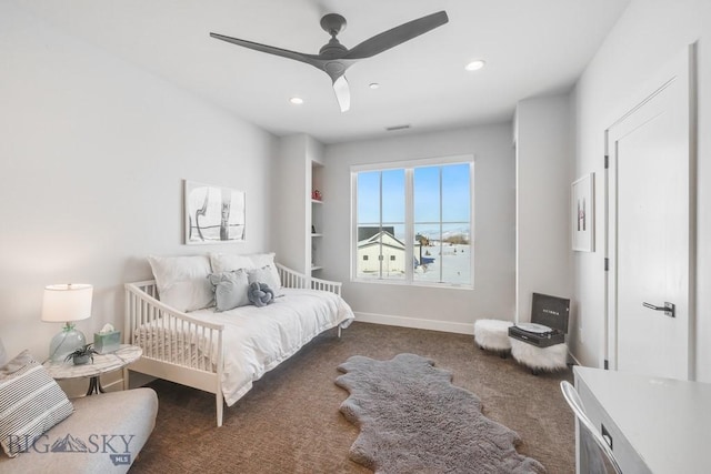 carpeted bedroom featuring ceiling fan