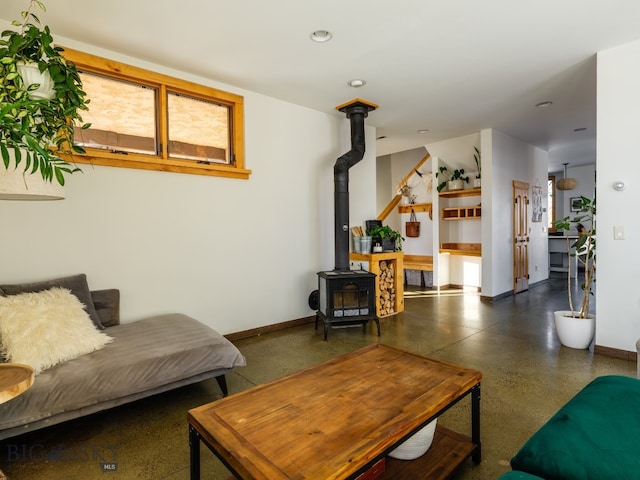 living room featuring a wood stove