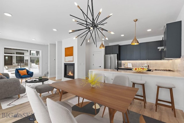 dining space featuring light hardwood / wood-style floors