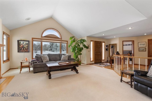 living area featuring light carpet, high vaulted ceiling, baseboards, and recessed lighting